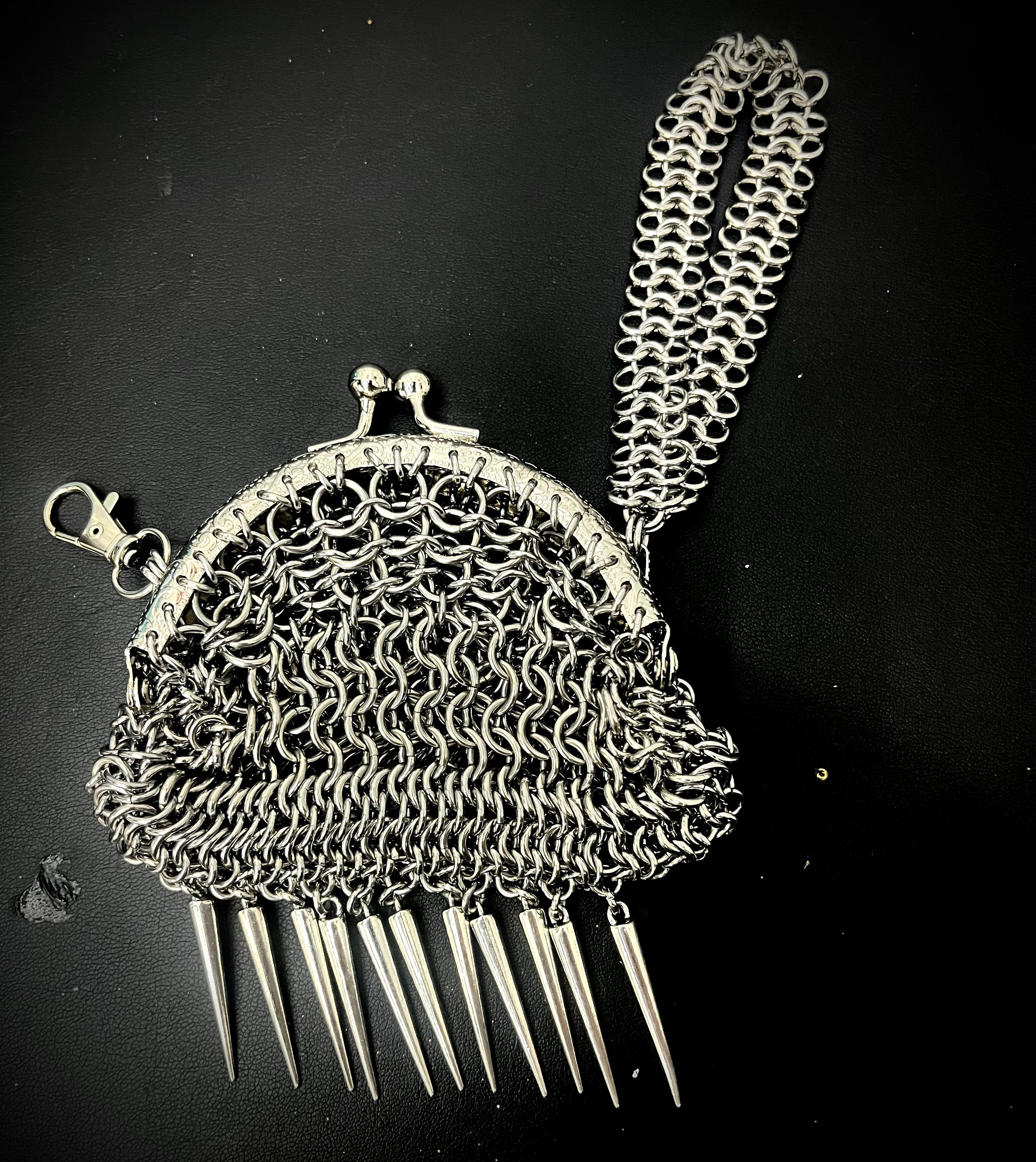 Spike fringe chainmail purse