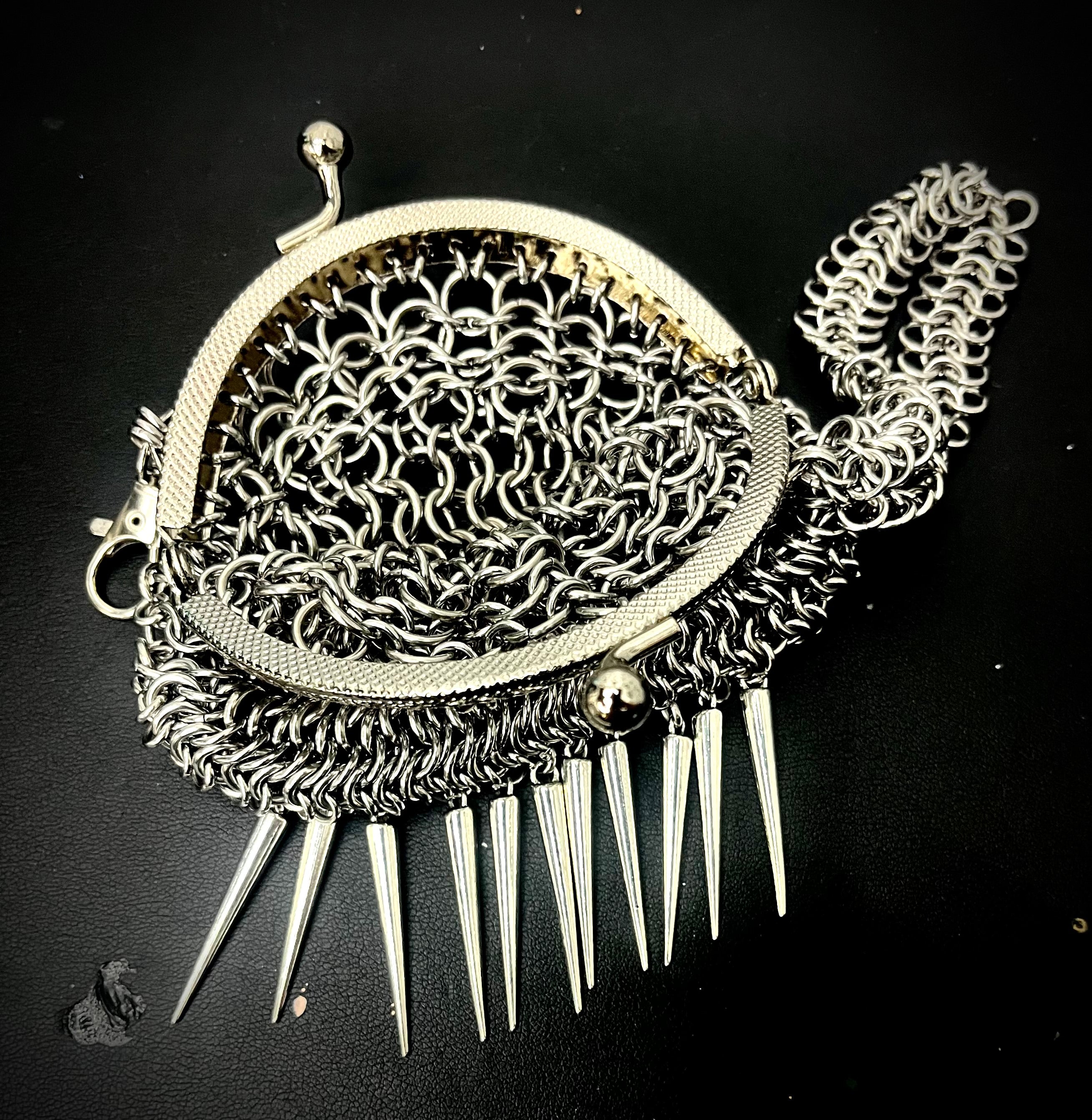 Spike fringe chainmail purse