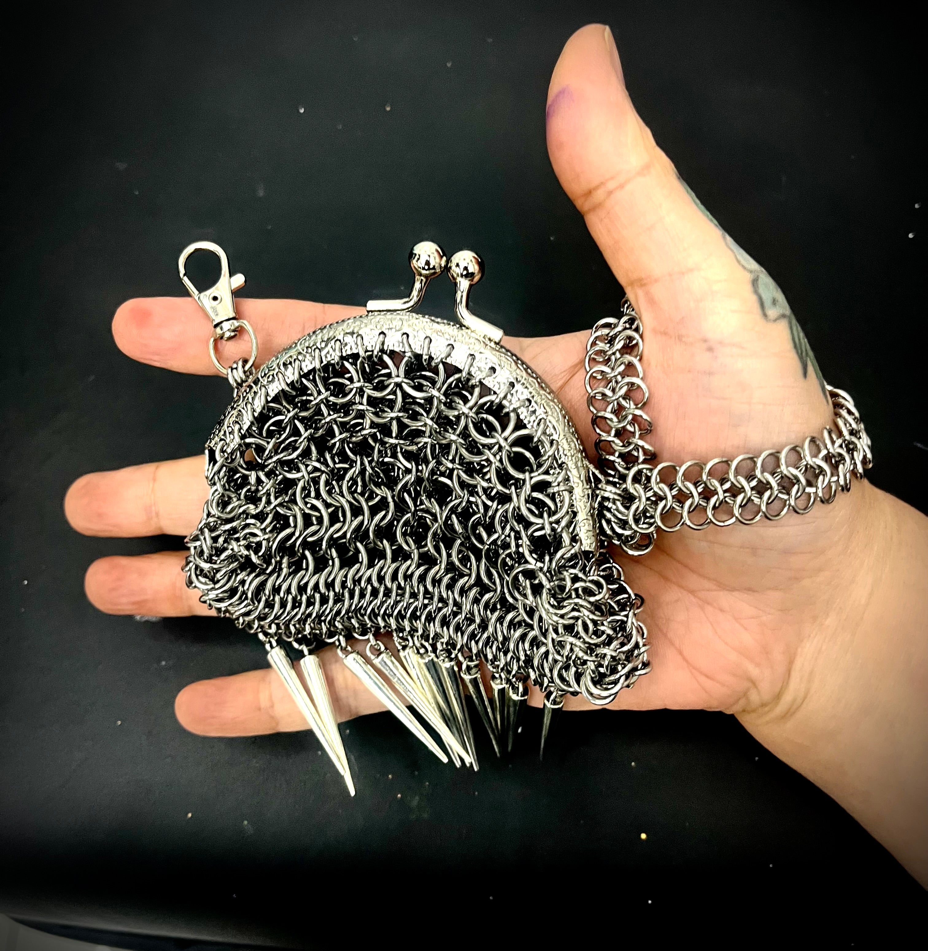 Spike fringe chainmail purse